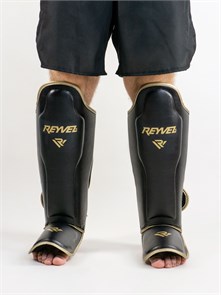 Защита голени и стопы  Reyvel МТ черно-золотая f4f66028-78ec-11ee-0a80-06320018ac5d